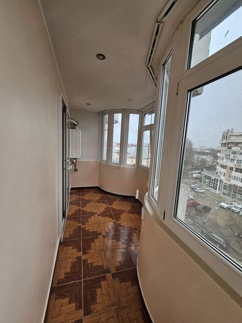 De închiriat apartament 2 camere decomandat -- Baia Comunală - Poză 6