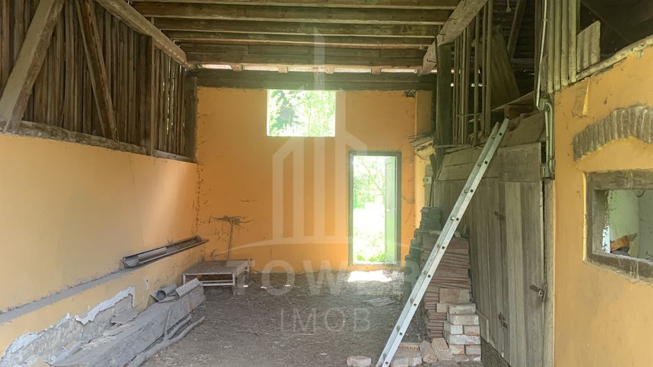 Casă în centrul Cisnădioarei cu 243mp de locuit și teren de 936mp - Poză 11