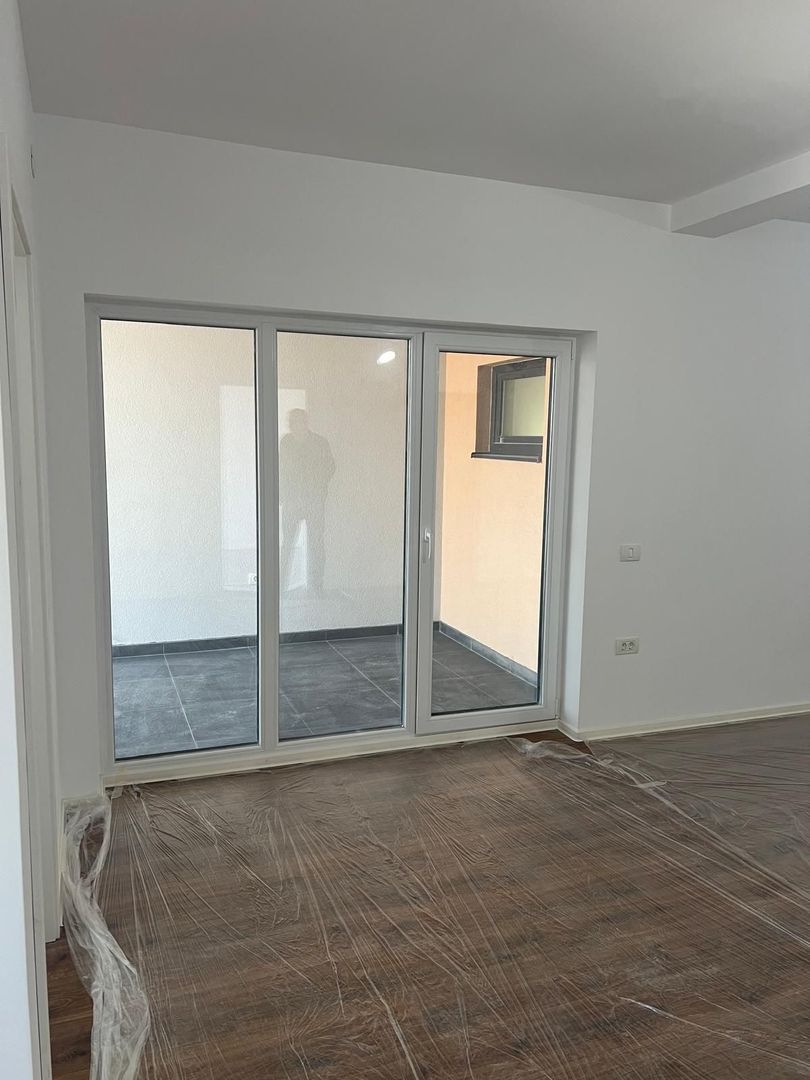 Apartament cu 3 camere de vânzare în Mosnita Noua - Poză 8