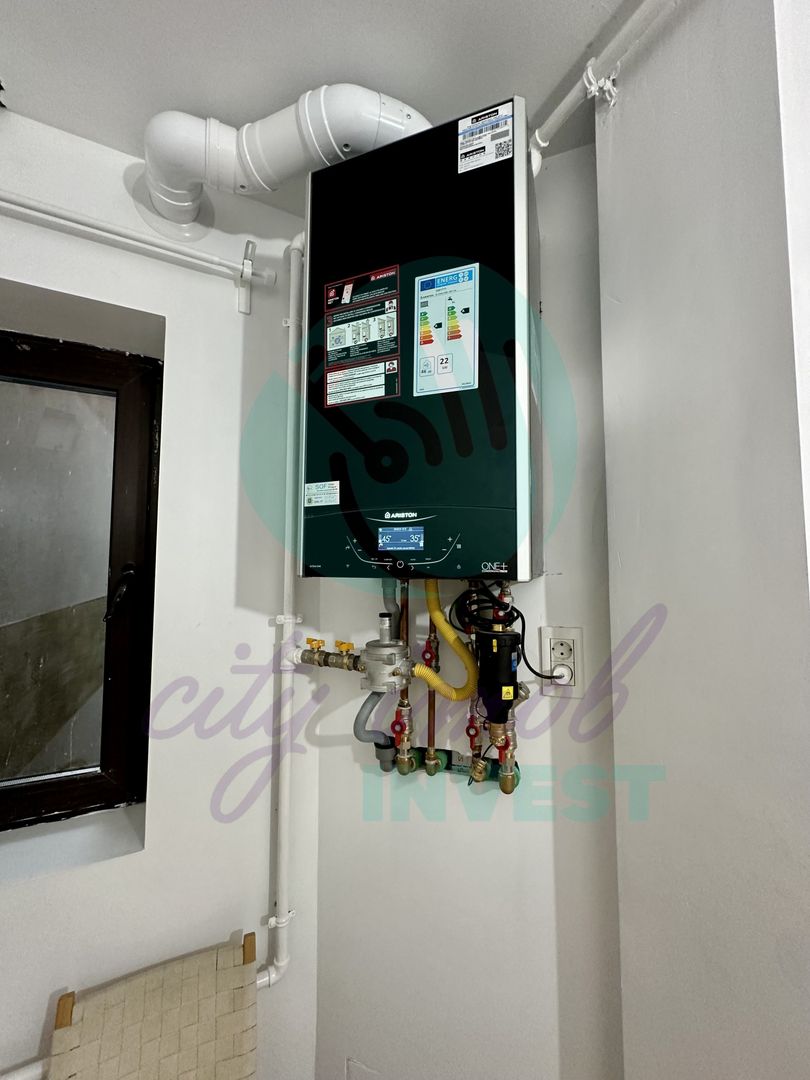 Garsoniera renovata intr-o zona boema - Poză 12