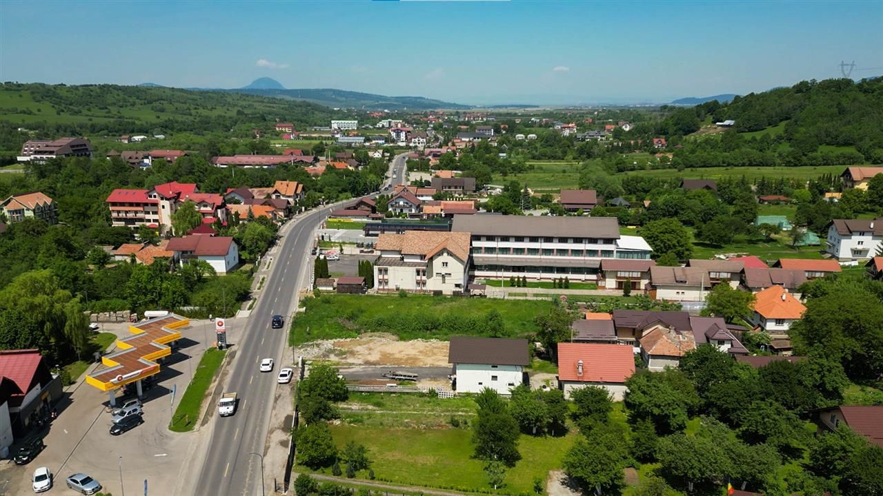 Teren intravilan,cu utilitati, front stradal apreciabil - Poză 5