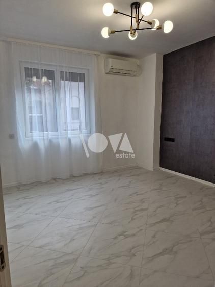 Pentru inchiriere Duplex 5 camere ( Parter + Demisol ) in vila Piata Romana - Poză 4