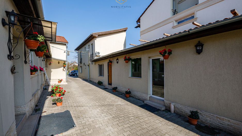 Proprietatea ideala pentru investiție, spații generoase, teren 1.200mp - Poză 17