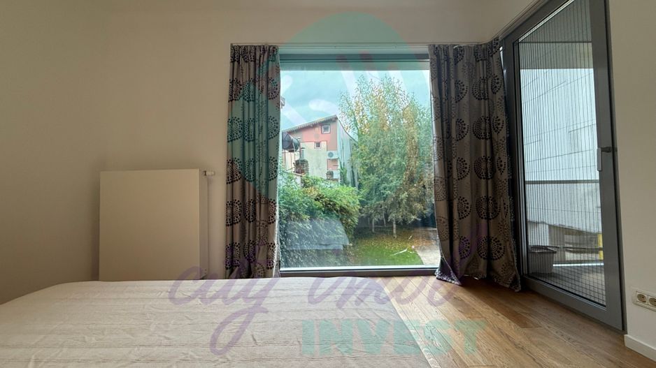 2 camere cu design industrial – un refugiu urban cu vedere spre gradina - Poză 11