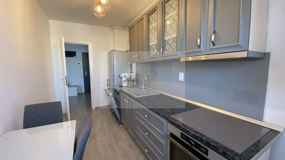 Închiriere apartament 3 camere - Poză 2