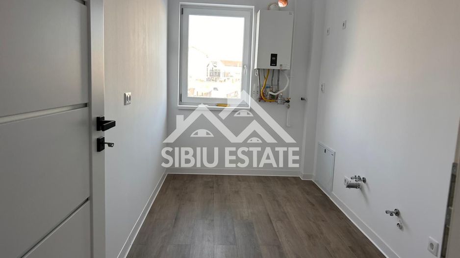 Garsoniera 41 mp, balcon bucatarie separata , intabulata zona Brana - Poză 11