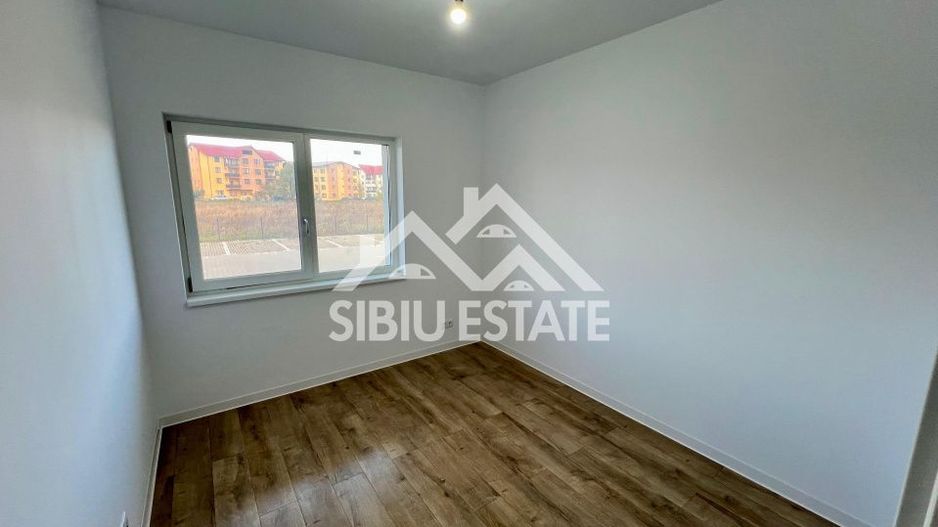 Apartament cu 3 camere, 2 bai, boxa 20 mp. loc de parcare -Finisat la cheie - Poză 4