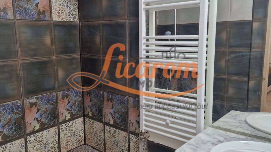 Garsoniera in casa str Iuliu Maniu curte comuna. - Poză 11