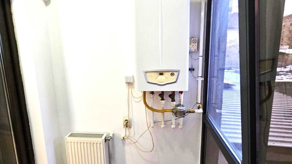 Închiriez garsonieră modernă  Piața Alba Iulia, centrală proprie - Poză 7