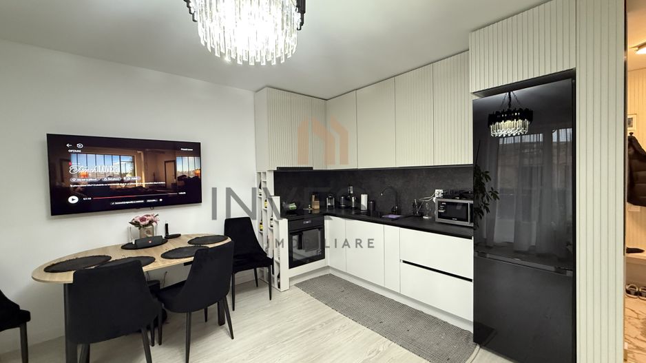 Locuință elegantă cu terasă generoasă și parcare subterană - Poză 1