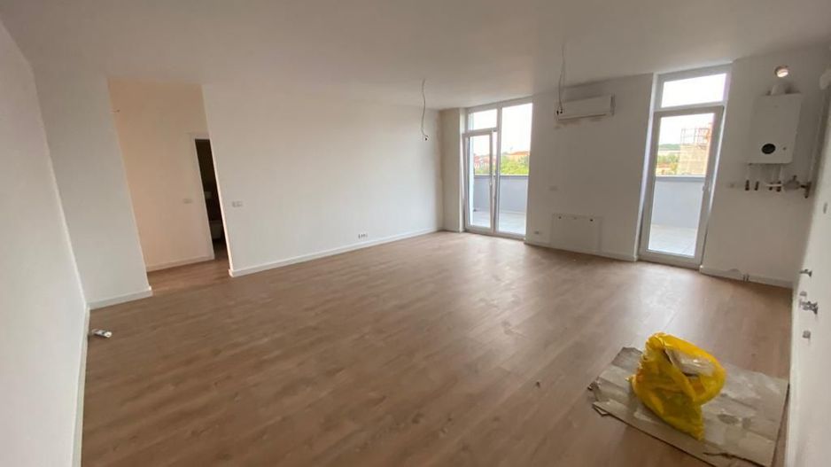Apartament bloc nou 4 camere - Poză 1