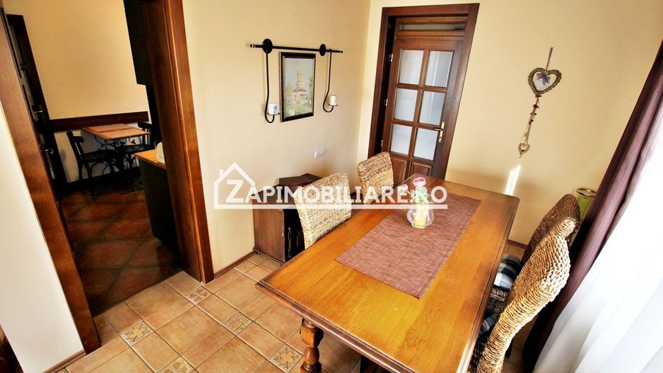 Casa 3 camere, 2 bai,1 garaj,teren 360 mp.zona Dambu Pietros - Poză 14