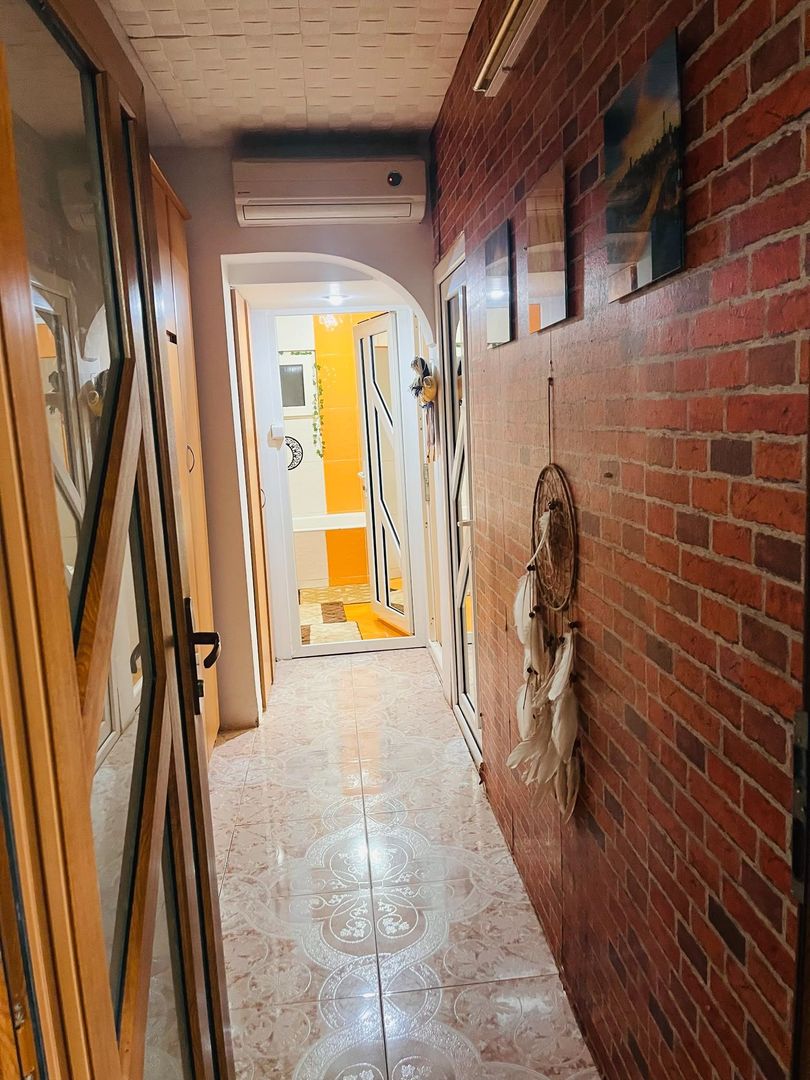 Confort inteligent! Apartament transformat in 3 camere, zona 1 Mai - Poză 12