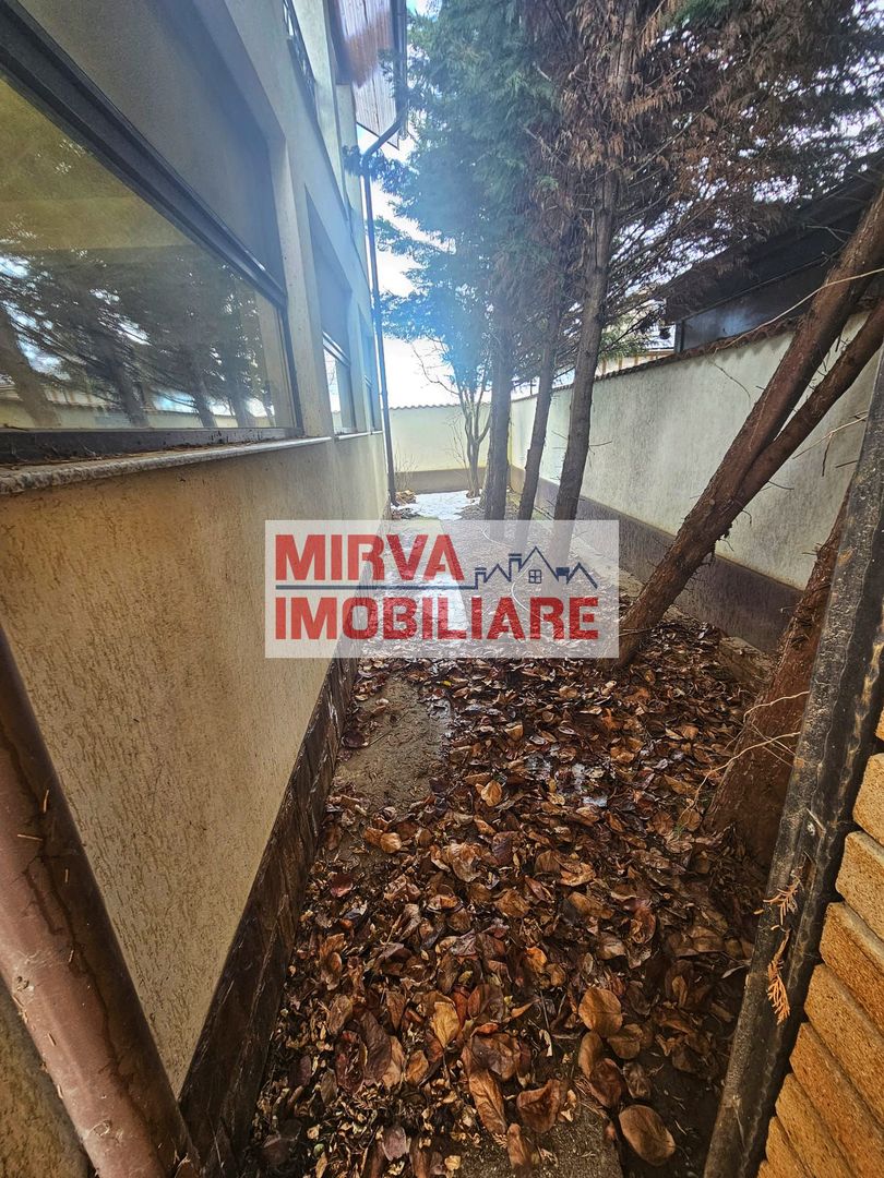 Vilă spațioasă Strejnicu S+P+1E+M, 8 camere, garaj, teren 595 mp - Poză 18