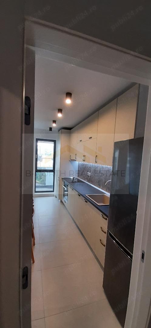 Apartament de închiriat 2 camere Nusco City Pipera | Vedere către grădina - Poză 4