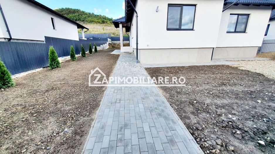 Casă la cheie pe 1 nivel 4cam. 2 bai,1 dresing 650 mp. teren - Poză 18