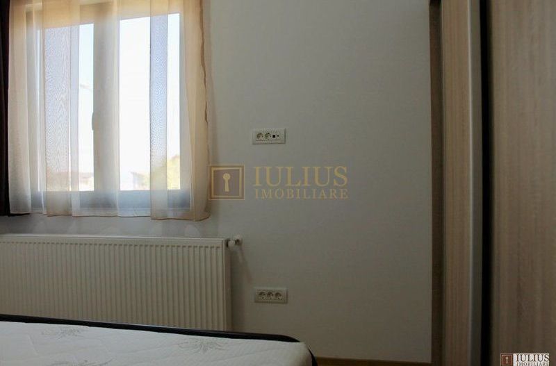 2 dormitoare, 80 mp utili, gradina si curte proprie de 300mp. - Poză 10