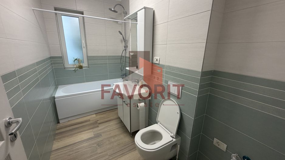 Bucatarie inchisa. Curte proprie. Cu 2 bai - Poză 11